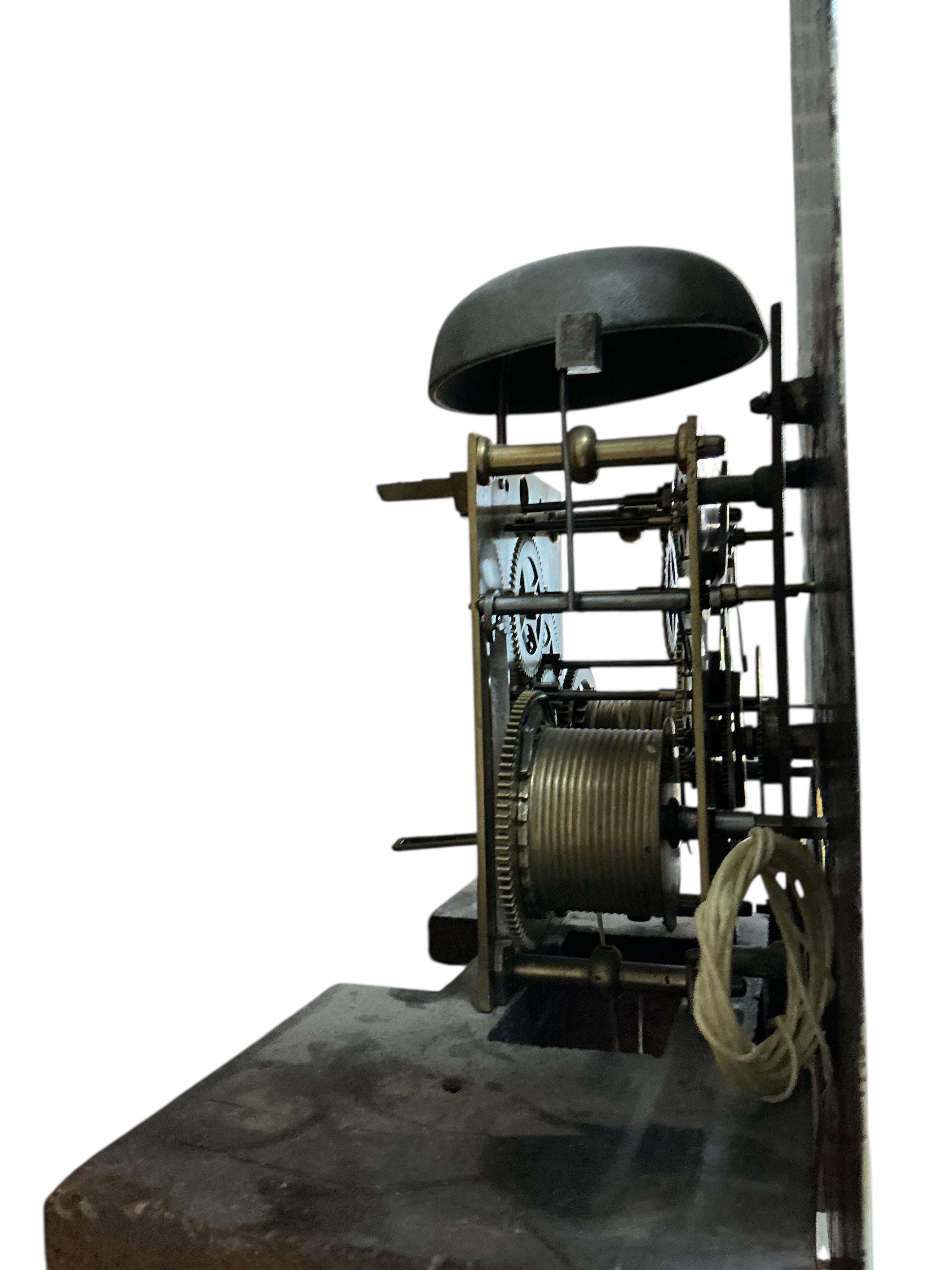 A George III oak eight day longcase clock, the arched painted enamel dial with Roman numerals and outer Arabic minutes, subsidiary seconds dial and calendar aperture, marked Joshua Smith, Leicester, height 216cm